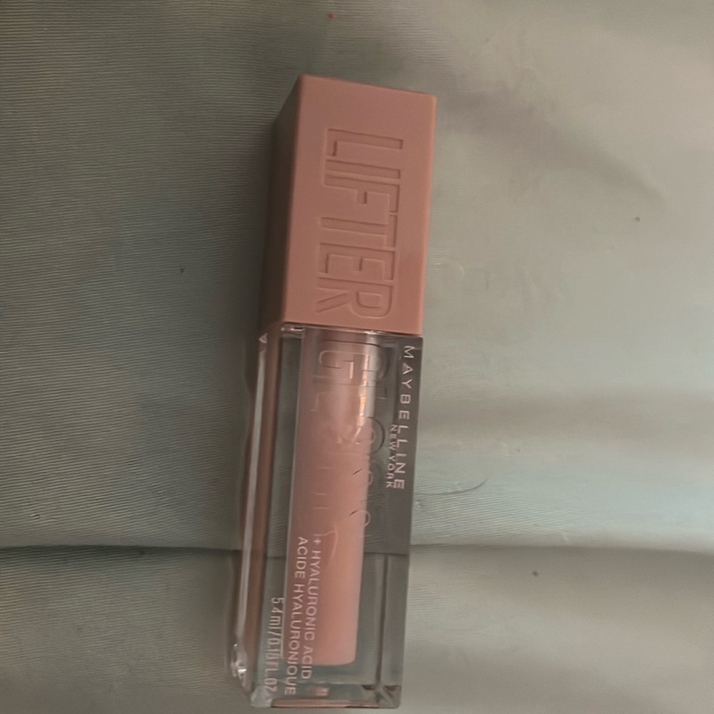 Maybelline, New York lifter gloss with high hydronic acid in the shade 002 ice